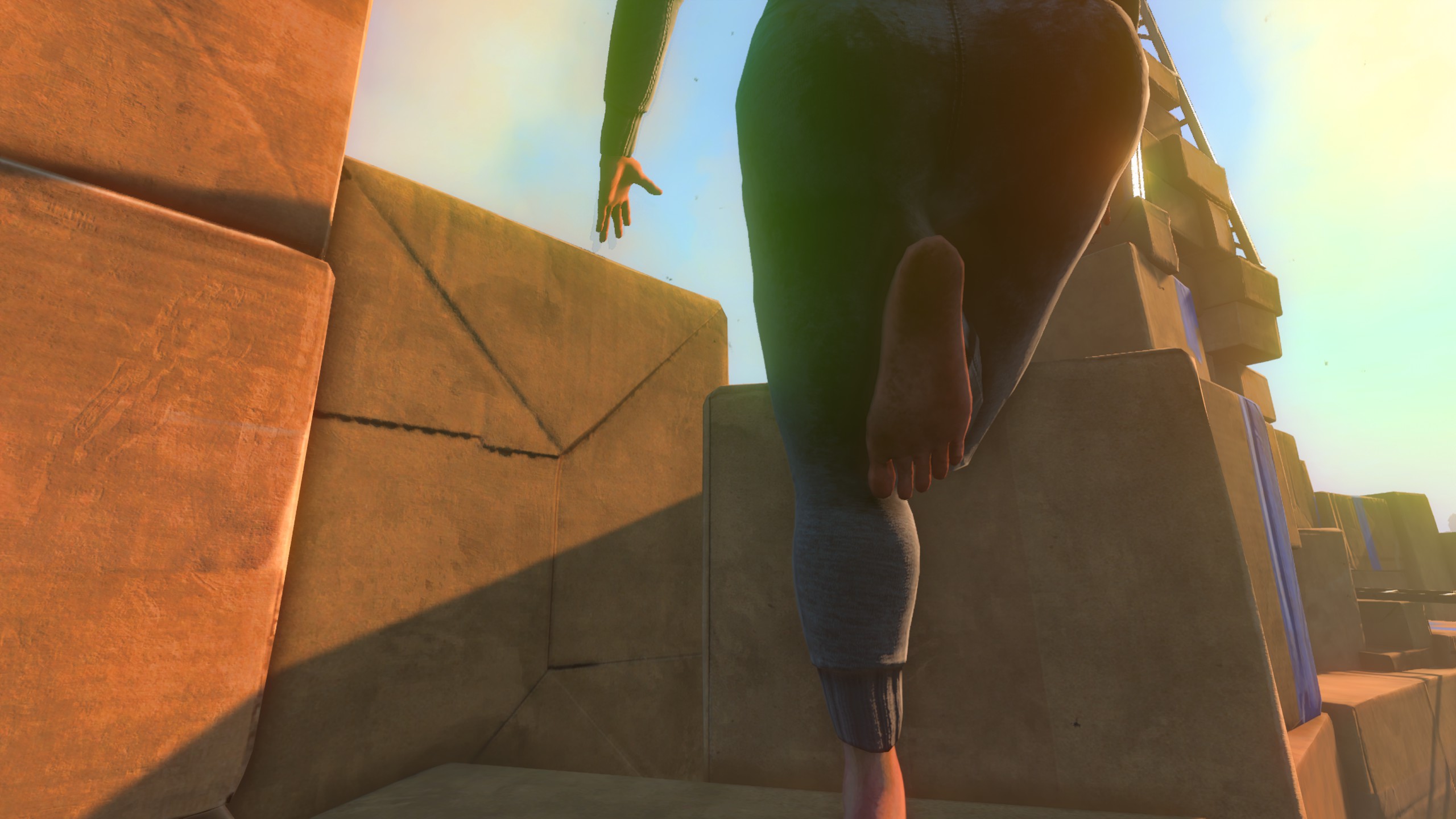 A screenshot of Baby Steps, showing the lower half of Nate, including his large butt and a bare foot pointed conspicuously right at the camera.